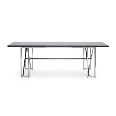 ClassiCon Double X by Eileen Gray. A sleek black tabletop rests on geometric stainless steel legs.