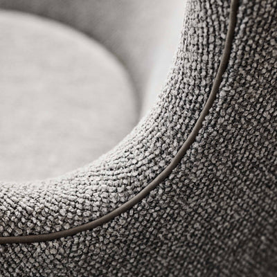 Fritz Hansen Egg™ Chair - 3316 by Arne Jacobsen. Gray textured fabric curves smoothly with a subtle piping detail.