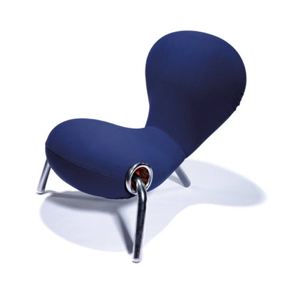 Cappellini Embryo Chair by Marc Newson. A sleek navy blue chair with metallic legs sits against a white background.