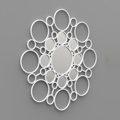 COVO Floret Mirror by Marta Laudani. White circular frames of varying sizes cluster together on a gray wall.