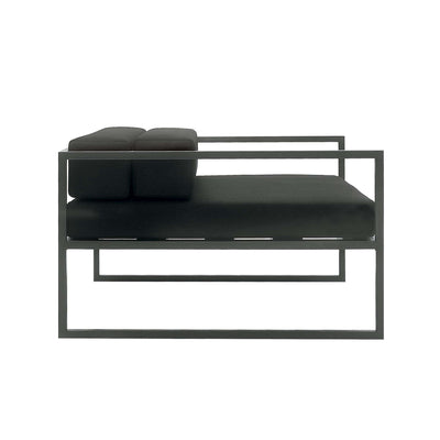 Cappellini Fronzoni '64 Armchair by AG Fronzoni 1964. Dark metal frame bed with black upholstered mattress and pillows.
