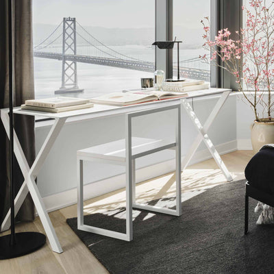 Cappellini Fronzoni '64 Chair by AG Fronzoni 1964. A white desk with X-frame legs overlooks a bridge view.