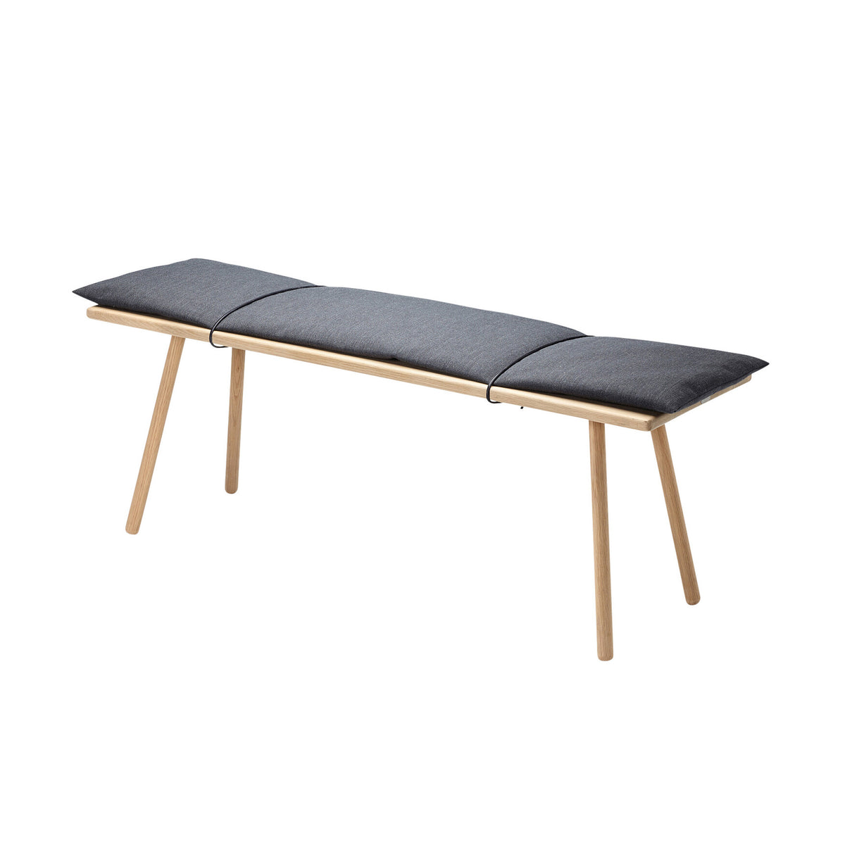 Fritz Hansen Georg Bench by Chris Liljenberg Halstrøm. A wooden bench with three dark gray cushioned sections.