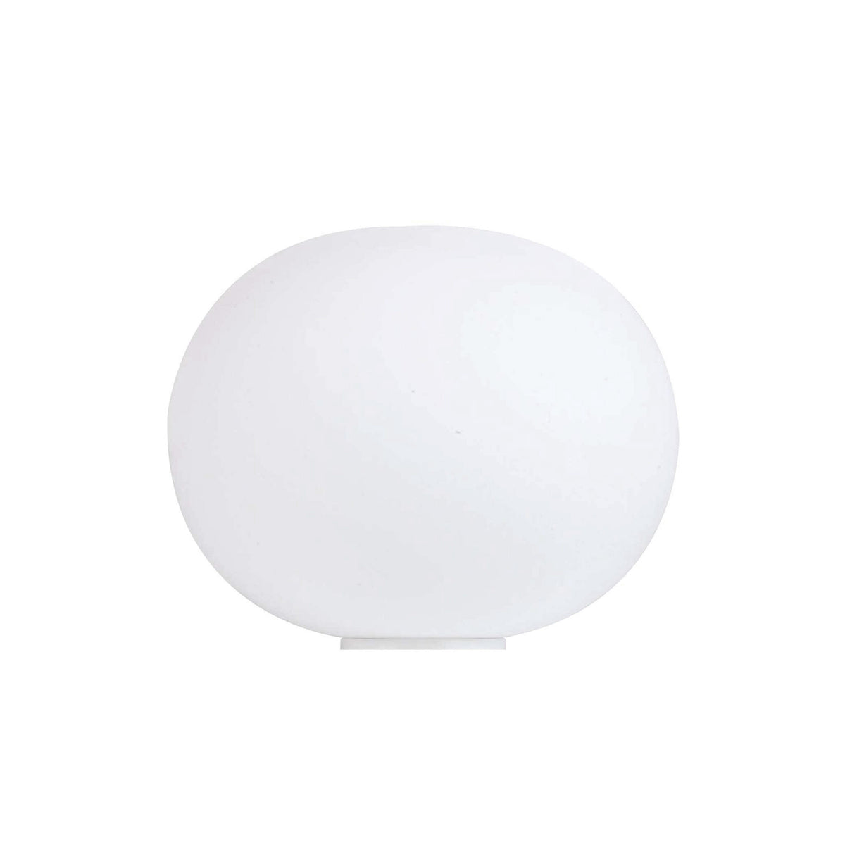 Flos Glo-Ball Basic 1 by Jasper Morrison. A smooth white spherical lamp glows softly against a plain background.