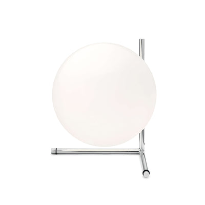 Flos IC Lights T2 by Michael Anastassiades. A frosted glass sphere rests on polished chrome metal rods.