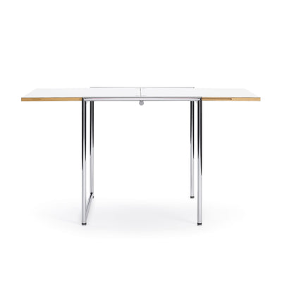 ClassiCon Jean Table by Eileen Gray. A modern table with a white top, chrome legs, and wooden side extensions.