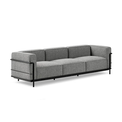 Cassina LC3 3 Seat Sofa by Le Corbusier. A gray upholstered sofa features a black metal frame and geometric cushioned design.