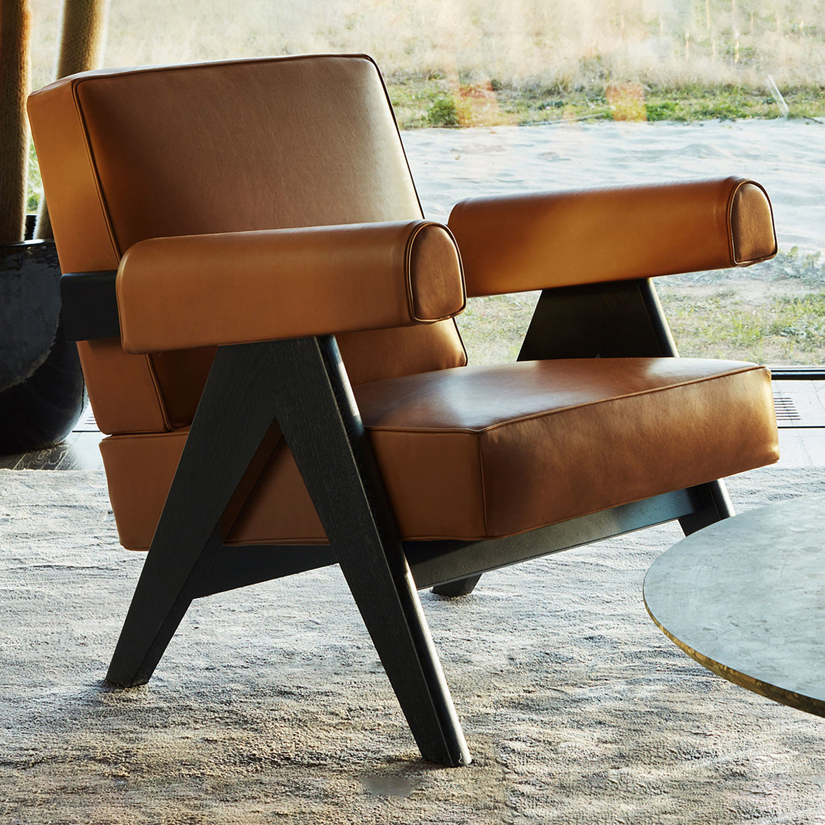 Mobile / Capitol Complex Armchair, designed by Pierre Jeanneret and made by Cassina