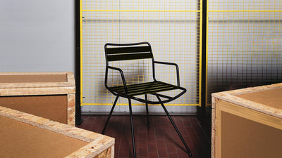 Desktop / Dan Chair with Armrests, designed by Patrick Norguet for Zanotta