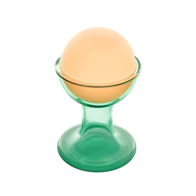 Established & Sons Gelato Lamp by Carlo Nason. A peach-colored sphere rests in a green glass pedestal bowl.