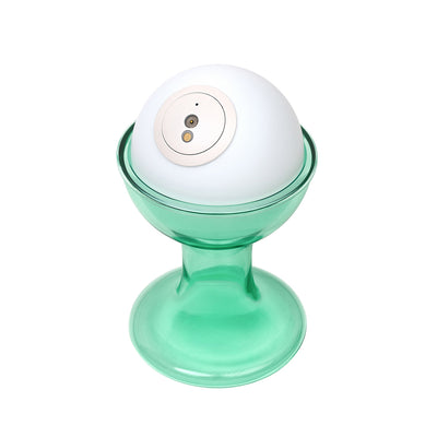 Established & Sons Gelato Lamp by Carlo Nason. A mint green and white spherical device with a camera sits on a pedestal base.
