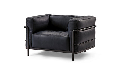 Desktop / LC3 Armchair, designed by Le Corbusier, Pierre Jeanneret, and Charlotte Perriand and made by Cassina