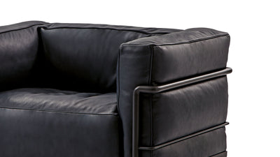 Desktop / LC3 Armchair, designed by Le Corbusier, Pierre Jeanneret, and Charlotte Perriand and made by Cassina