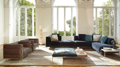Desktop / LC3 Armchair, designed by Le Corbusier, Pierre Jeanneret, and Charlotte Perriand and made by Cassina