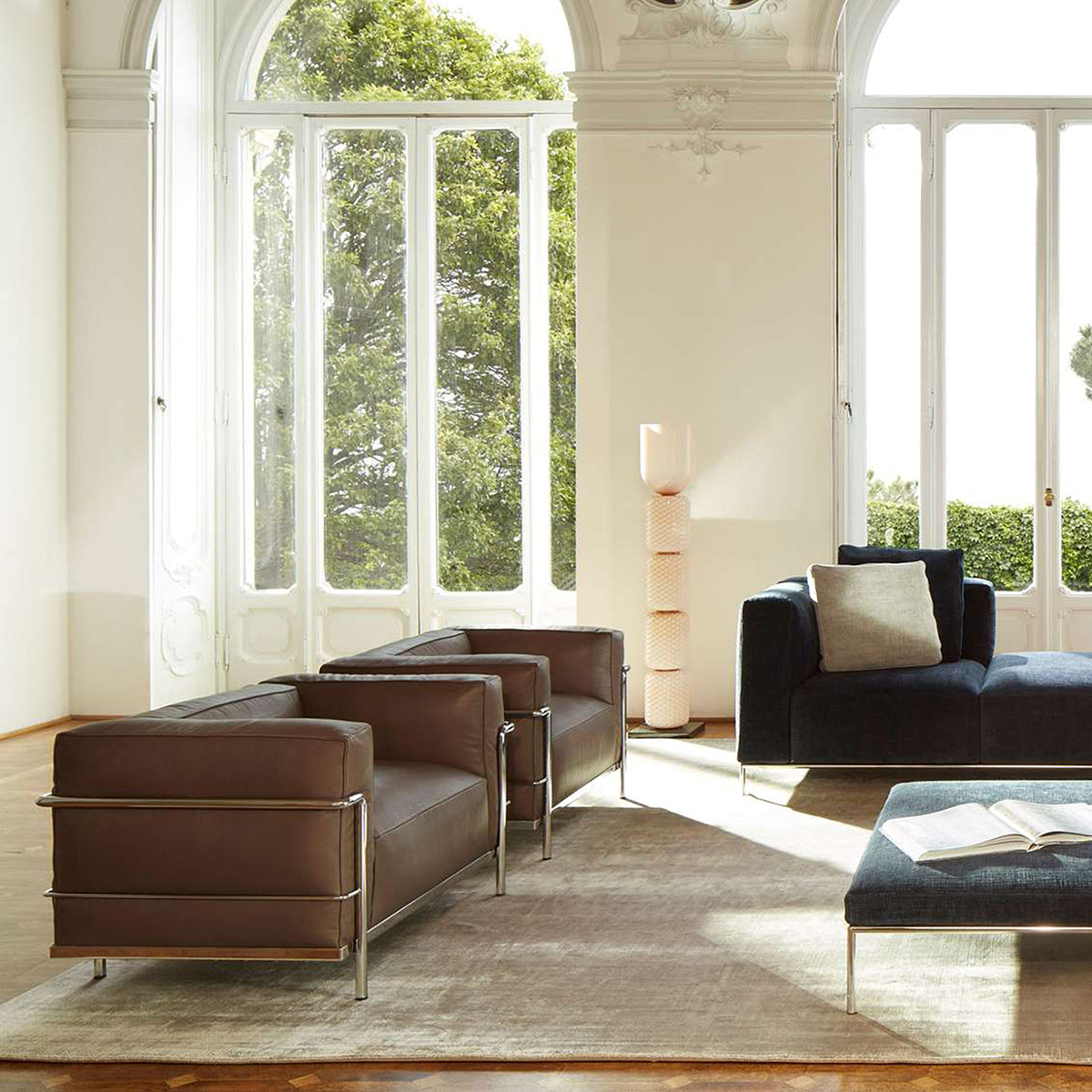 Mobile / LC3 Armchair, designed by Le Corbusier, Pierre Jeanneret, and Charlotte Perriand and made by Cassina