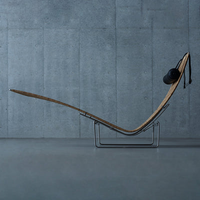 Mobile / PK24 Lounge Chair, designed by Poul Kjærholm and made by Fritz Hansen