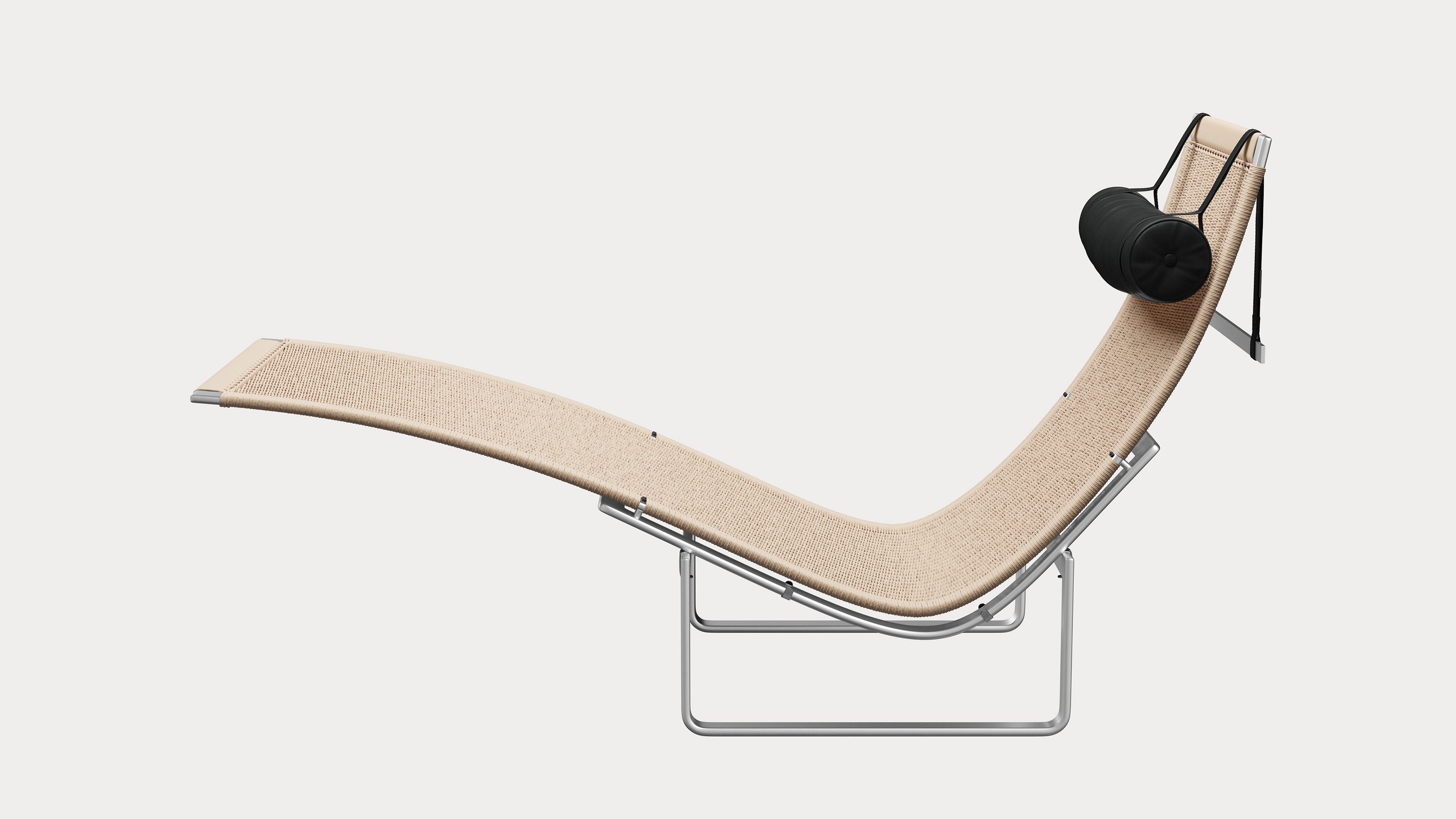 Desktop / PK24 Lounge Chair, designed by Poul Kjærholm and made by Fritz Hansen