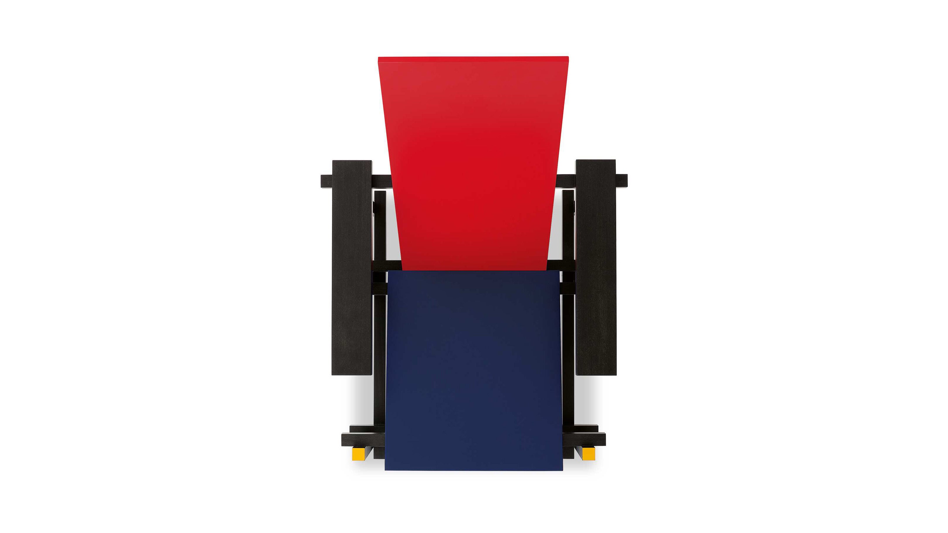 Desktop / Red and Blue Chair, designed by Gerrit T. Rietvelda nd made by Cassina