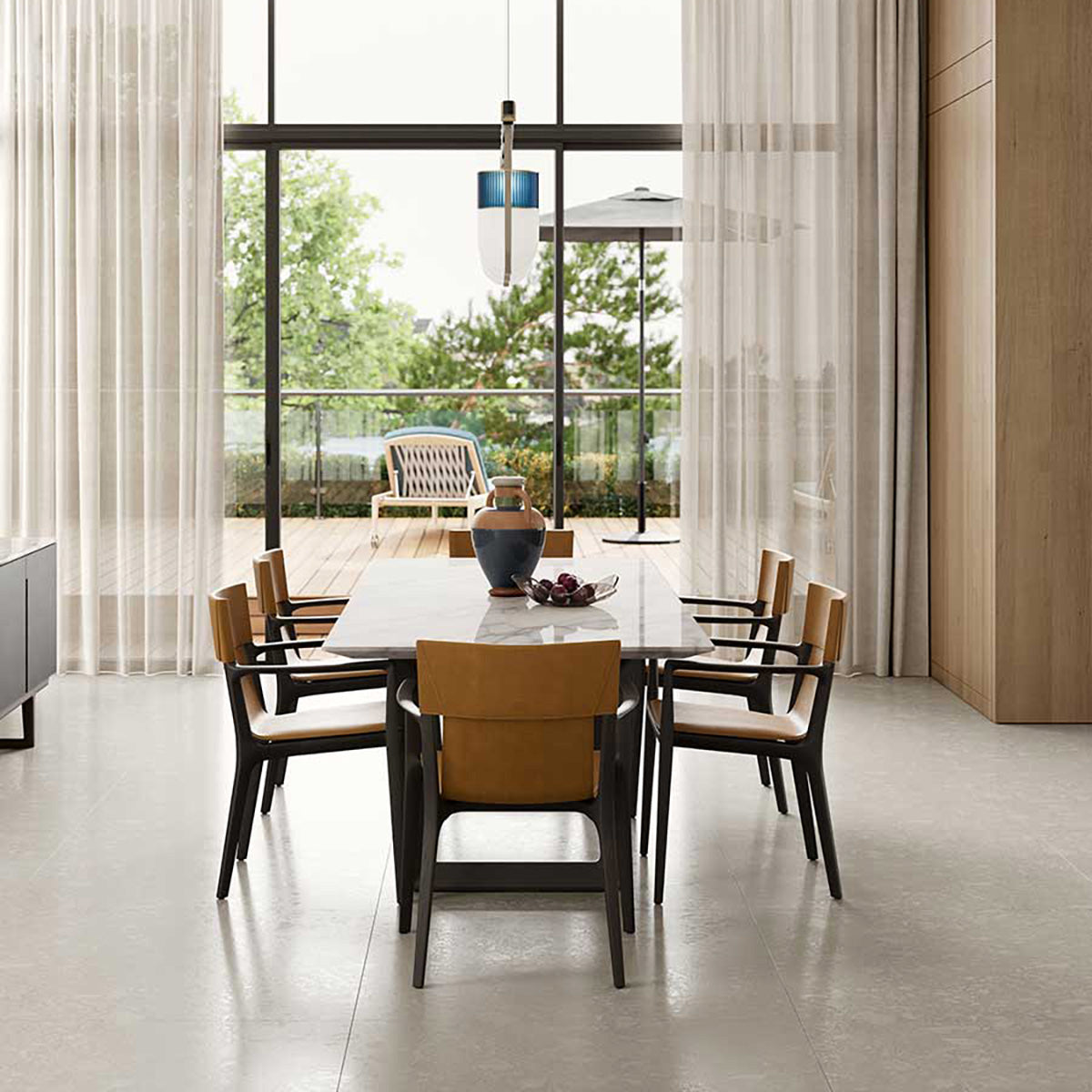Saddle Leather Cammello / Mobile / Isadora Chair with arms, designed by Roberto-Lazzeroni and made by Poltrona Frau