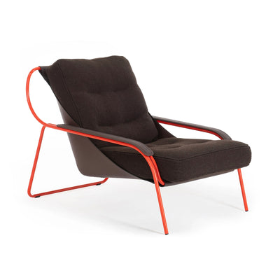 Zanotta Maggiolina by Marco Zanuso. A modern lounge chair features a black fabric seat with a striking red metal frame.
