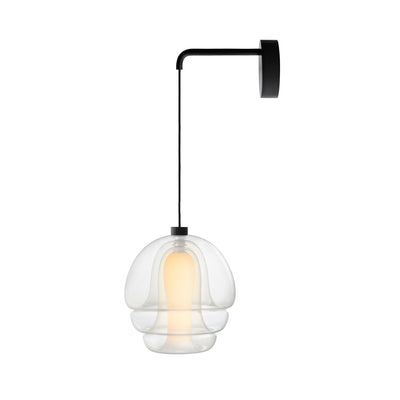 Established & Sons Medusa Wall Lamp by Carlo Nason. A black metal pendant lamp with a clear glass dome shade glows warmly.