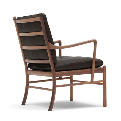 Carl Hansen & Søn OW149 Colonial Chair by Ole Wanscher. Wood frame chair with black leather seat and back.