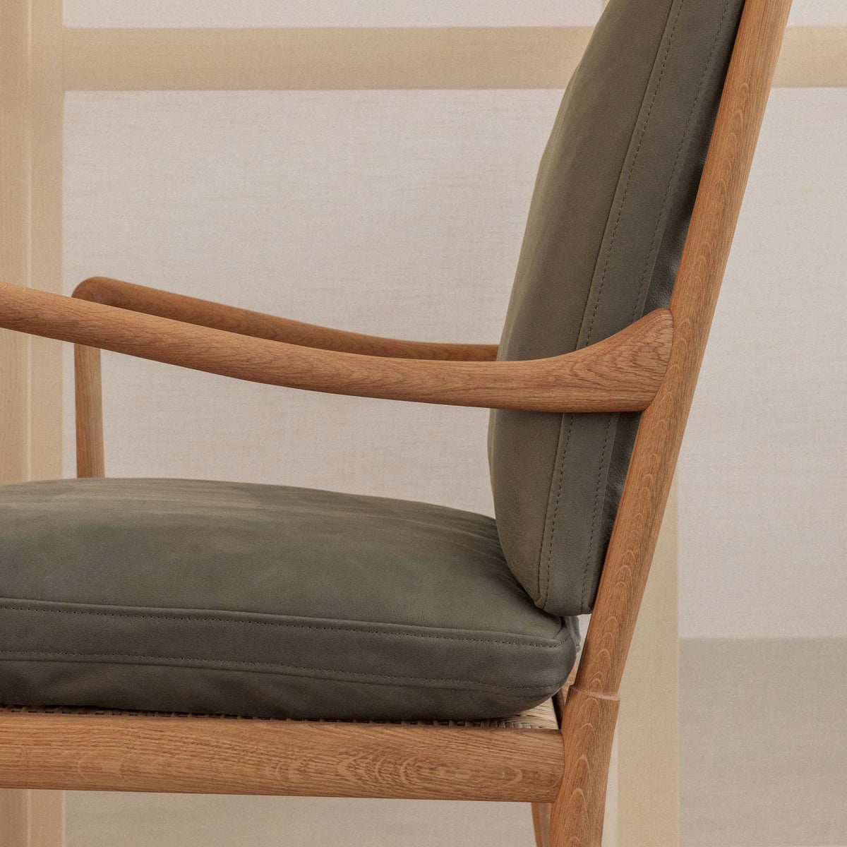 Carl Hansen & Søn OW149 Colonial Chair by Ole Wanscher. Wooden chair with olive green cushioned seat and back.