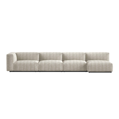 Cappellini Oblong Plus by Jasper Morrison. A long beige upholstered sectional sofa with plush cushions.
