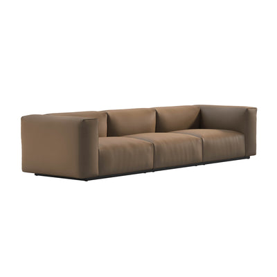 Cappellini Oblong Plus by Jasper Morrison. A long, taupe leather sofa with modular cushions sits against a white background.