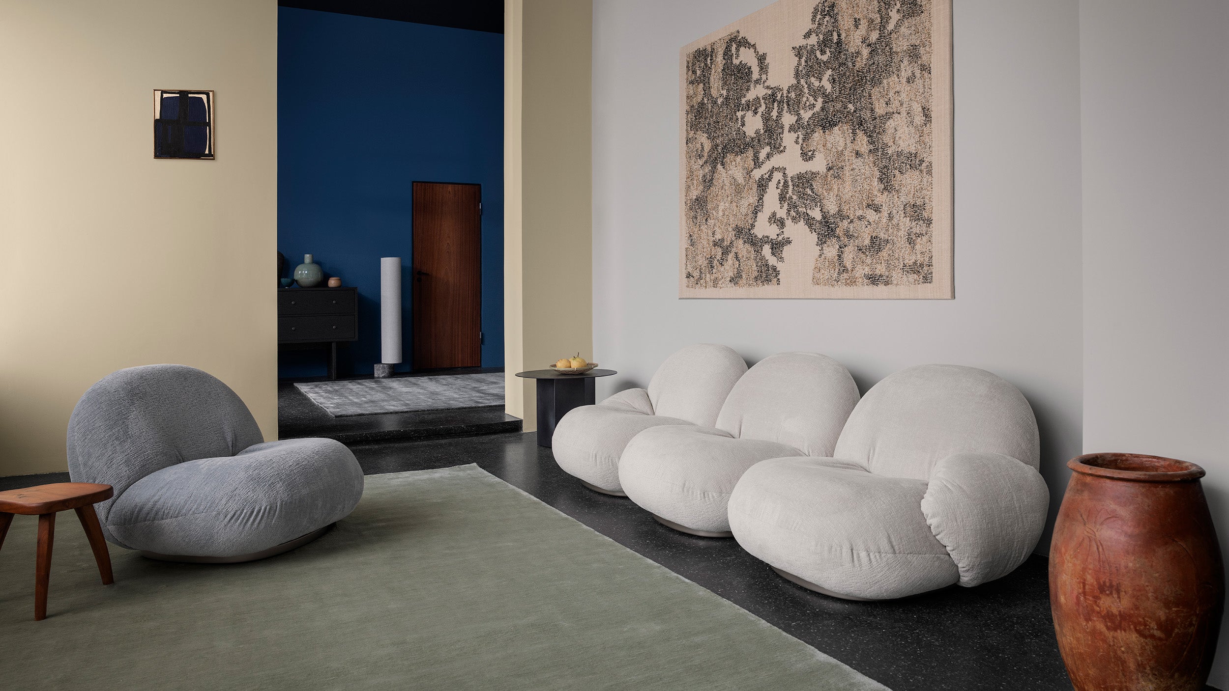 Desktop / Pacha Lounge Chair, designed by Pierre Paulin and made by Gubi