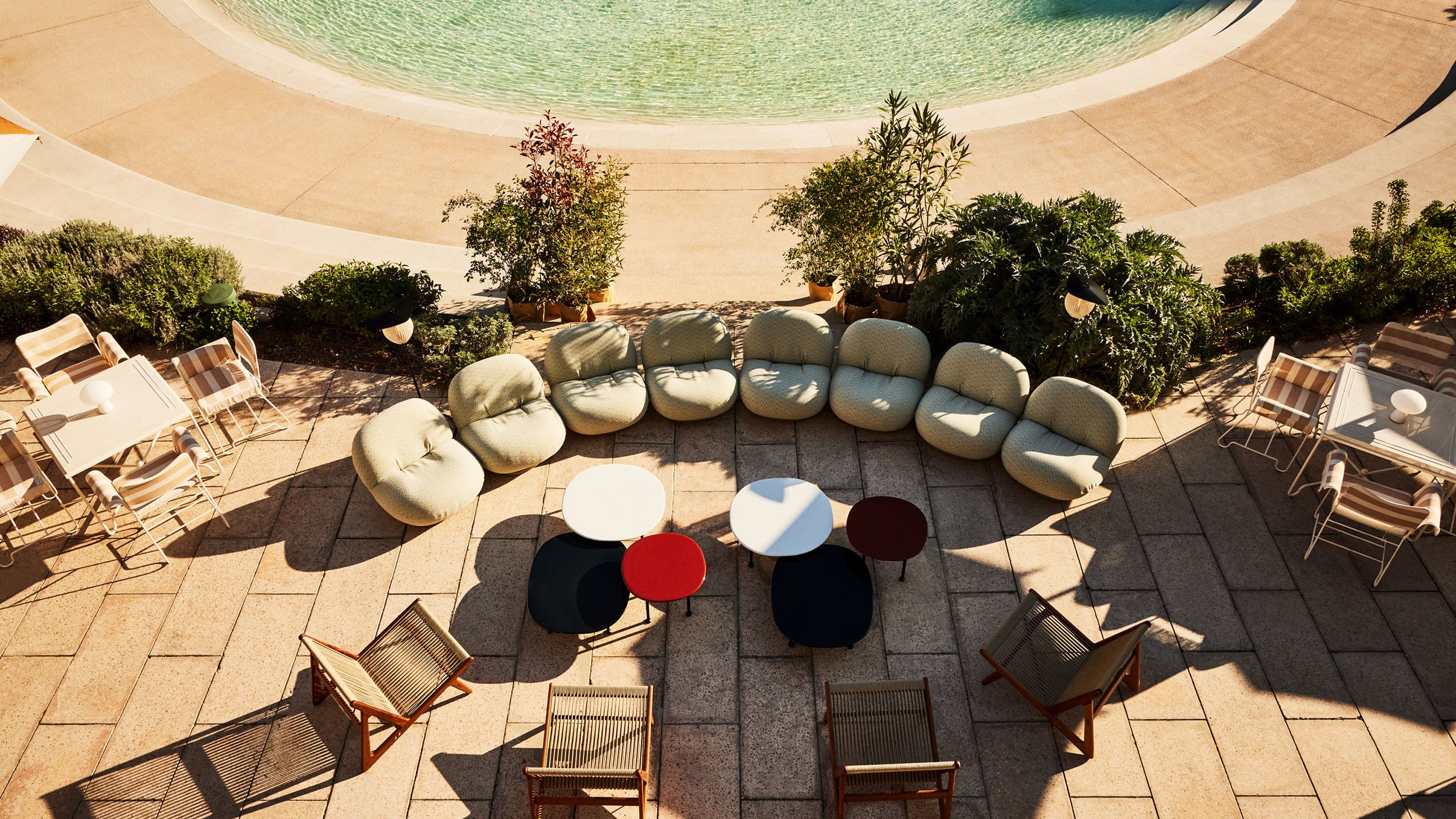 Desktop / Pacha Lounge Chair, designed by Pierre Paulin and made by Gubi