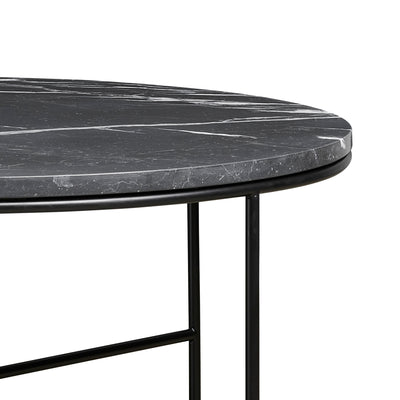 Fritz Hansen Planner™ MC300 Coffee Table by Paul McCobb. A round black marble table with a sleek metal base.