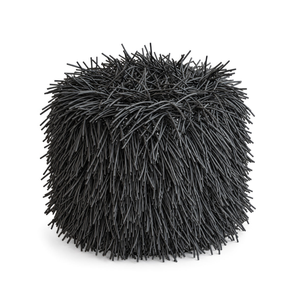 COVO Porcupine Pouf by Rosanna Contadini. A dense, dark spherical brush with fine black bristles radiating outward.