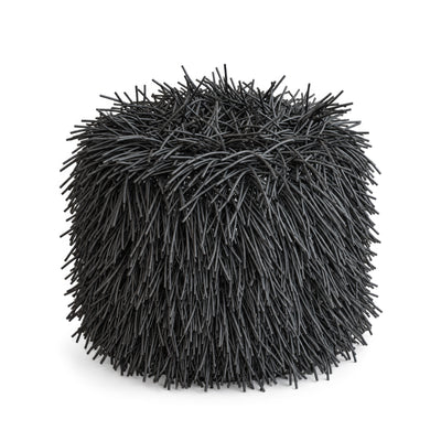 COVO Porcupine Pouf by Rosanna Contadini. A dense, dark spherical brush with fine black bristles radiating outward.