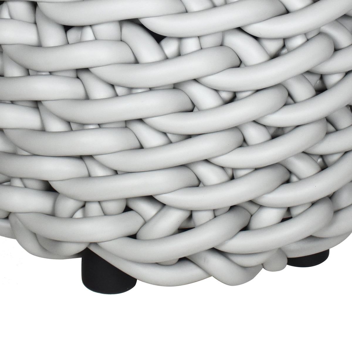 COVO Rebels 1 Pouf by Rosanna Contadini. Thick white twisted cords are woven together in a dense, textured pattern.