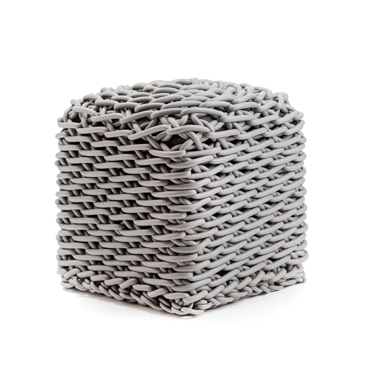 COVO Robusto Pouf by Rosanna Contadini. A chunky gray woven cube made from thick twisted rope material.