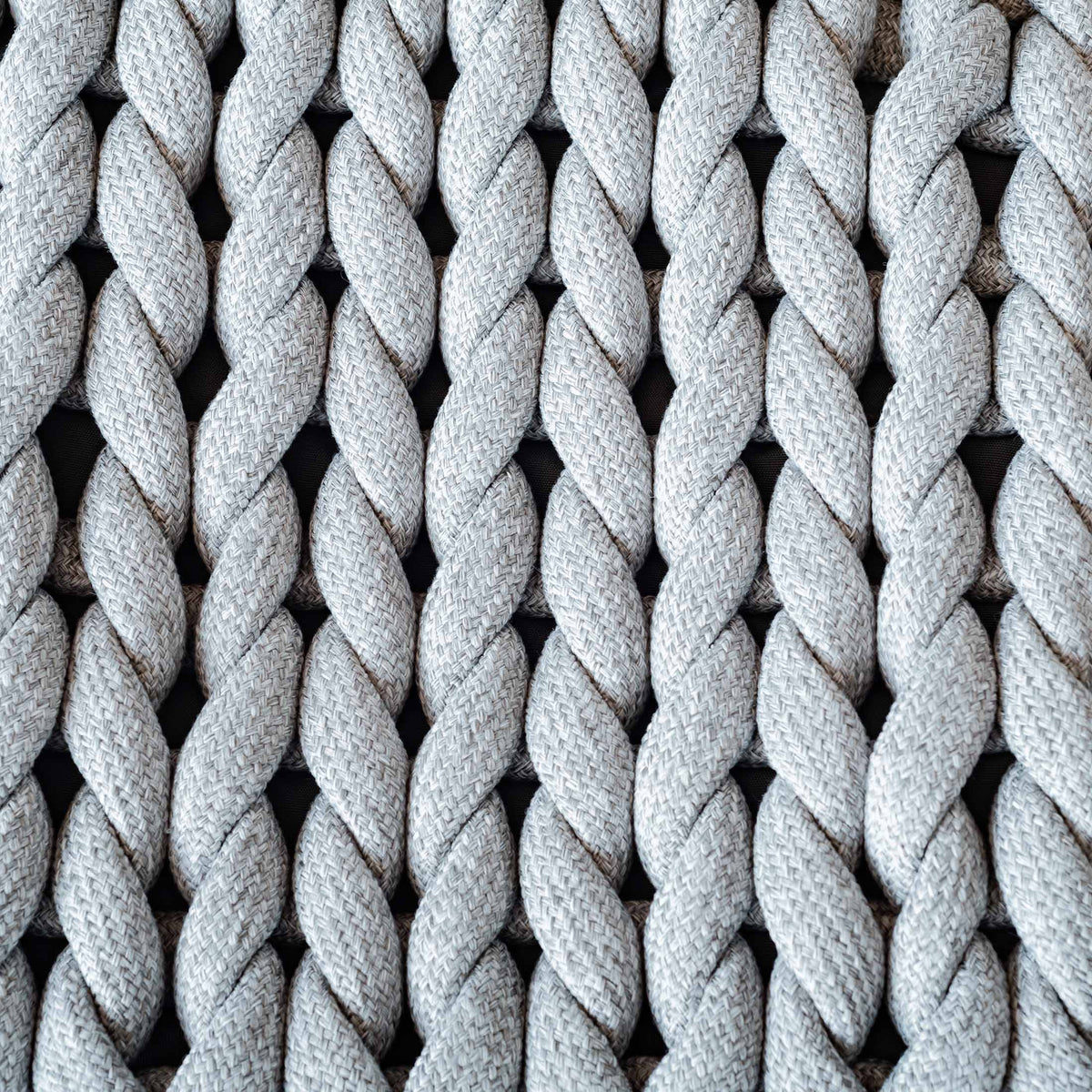 COVO Roxy Maxi Cushion by Rosanna Contadini. Twisted white rope strands form a uniform, textured nautical pattern.