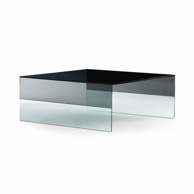 Cappellini Smoke by Marcel Wanders. A modern glass and black top table with layered transparent panels.