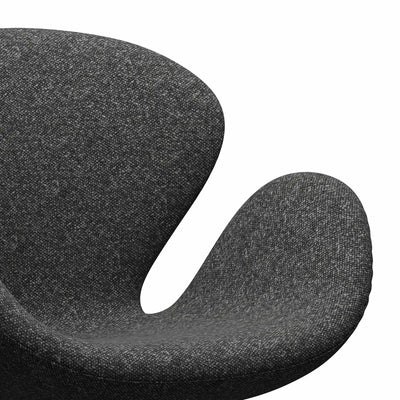 Fritz Hansen Swan™ Chair by Arne Jacobsen. A curved dark gray fabric surface with soft upholstery texture.