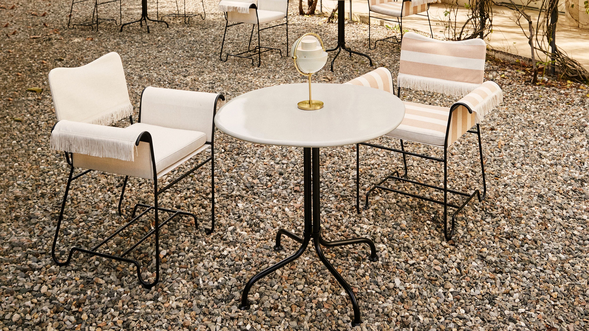 Desktop / Tropique Dining Chair, designed by Mathieu Matégot for Gubi