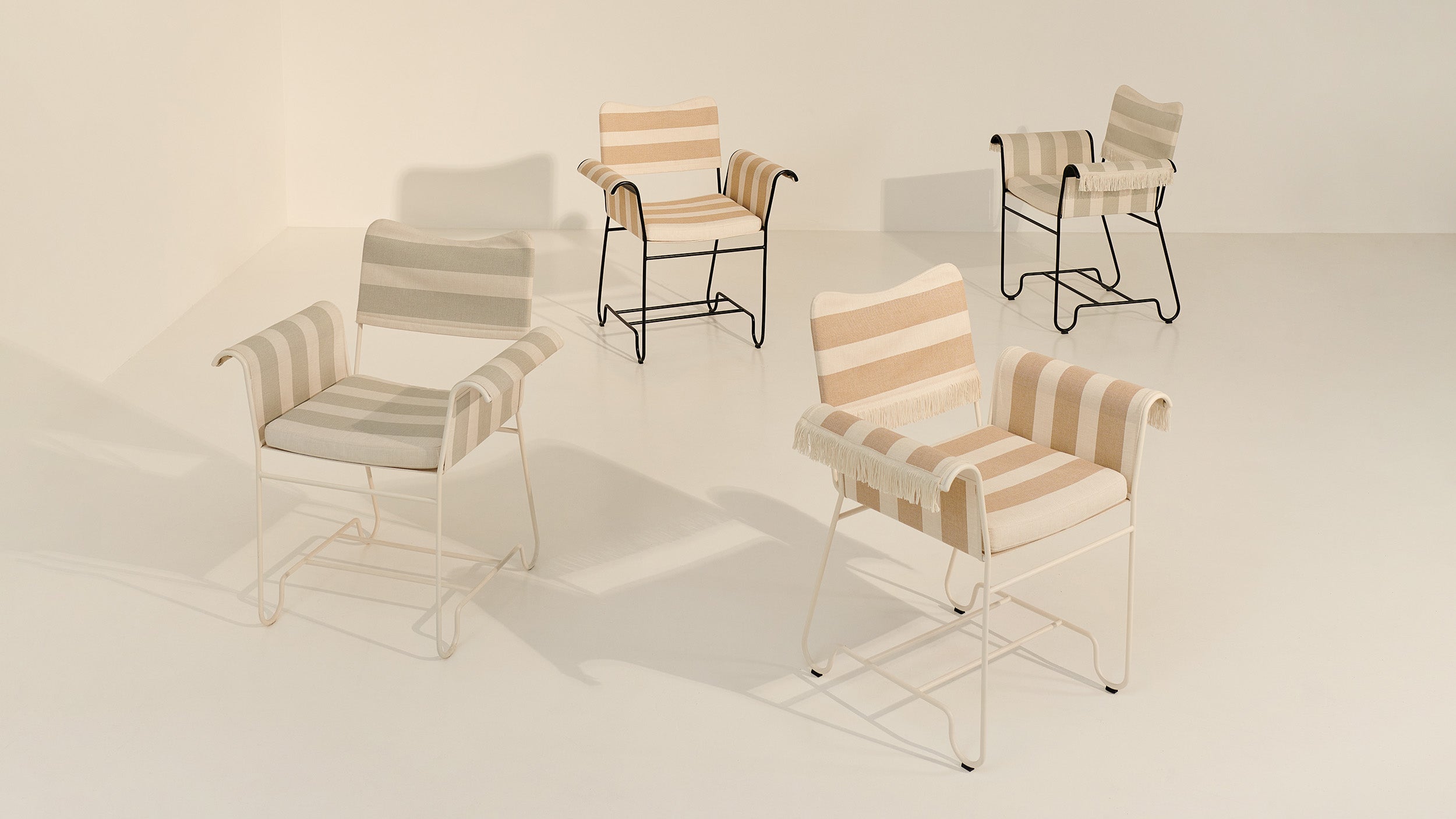 Desktop / Tropique Dining Chair, designed by Mathieu Matégot for Gubi
