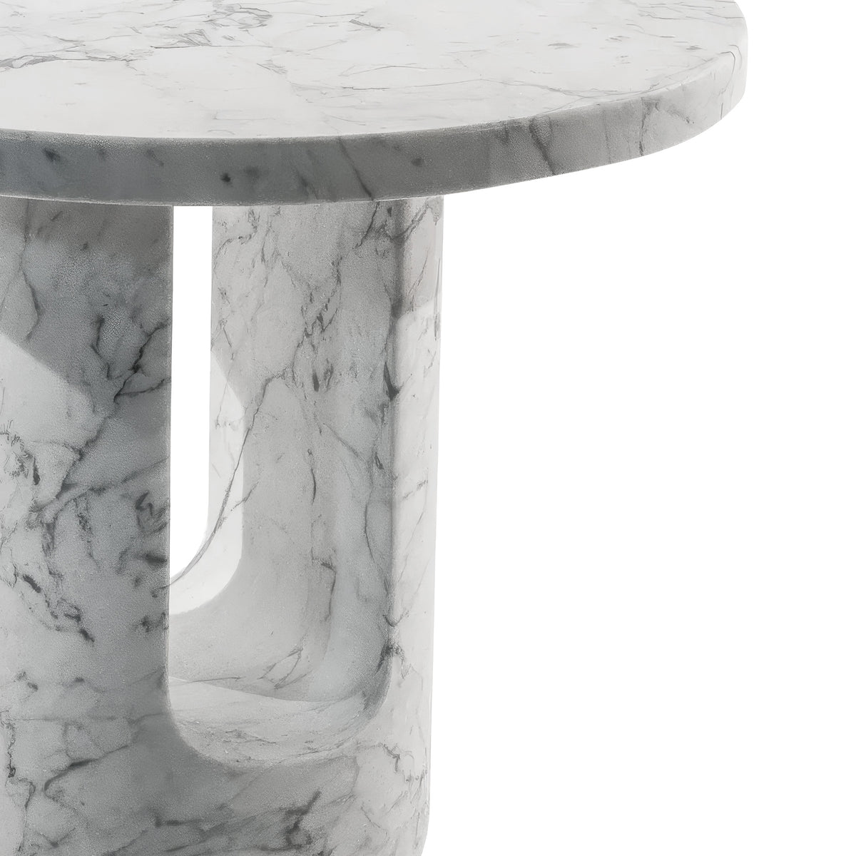 COVO U-TURN Table by Mikko Laakkonen. A round marble table with veined white and gray stone throughout.