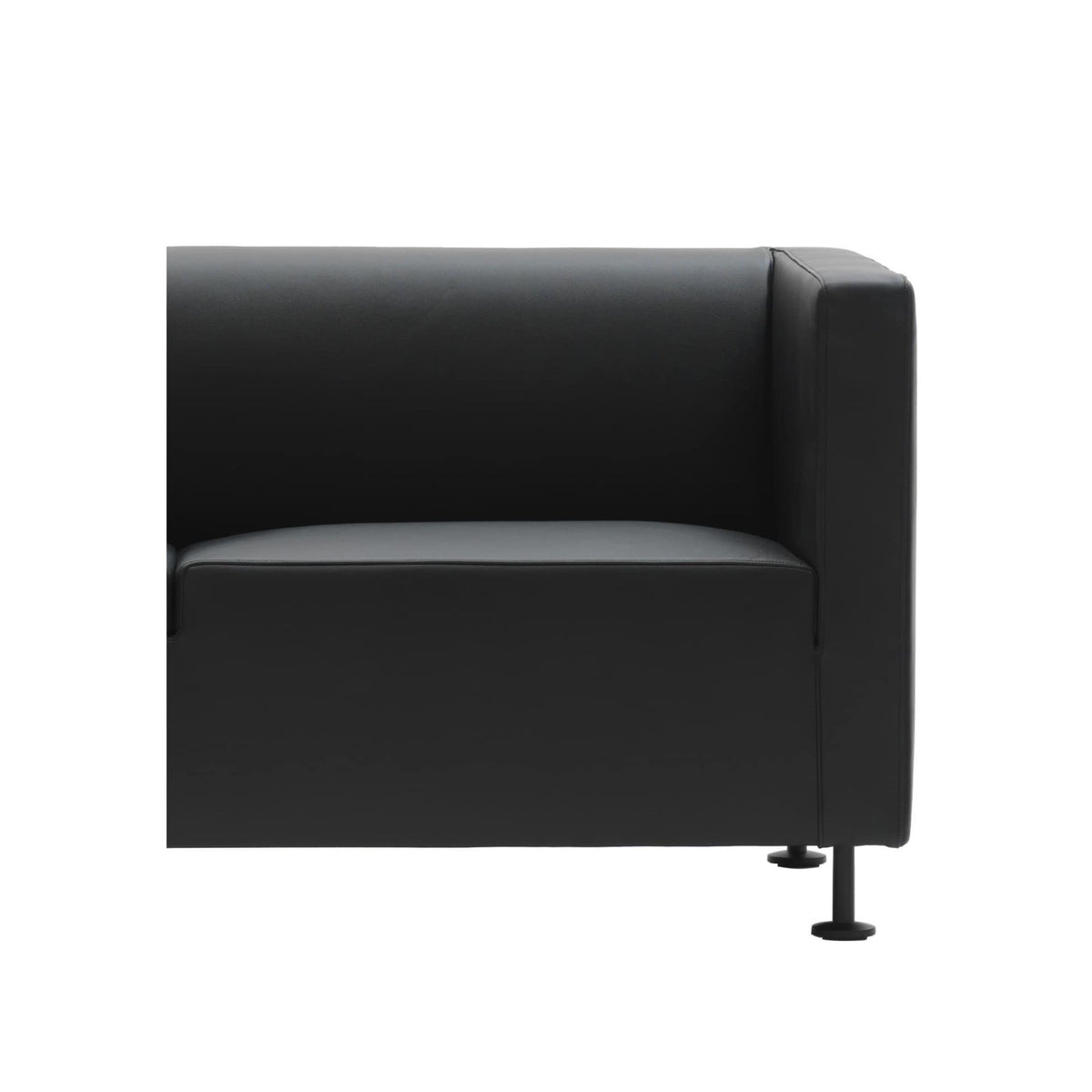 Cappellini Gambetta by Jasper Morrison. A sleek black leather armchair with modern metal legs.