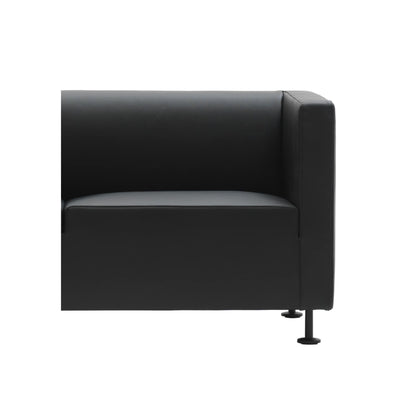 Cappellini Gambetta by Jasper Morrison. A sleek black leather armchair with modern metal legs.
