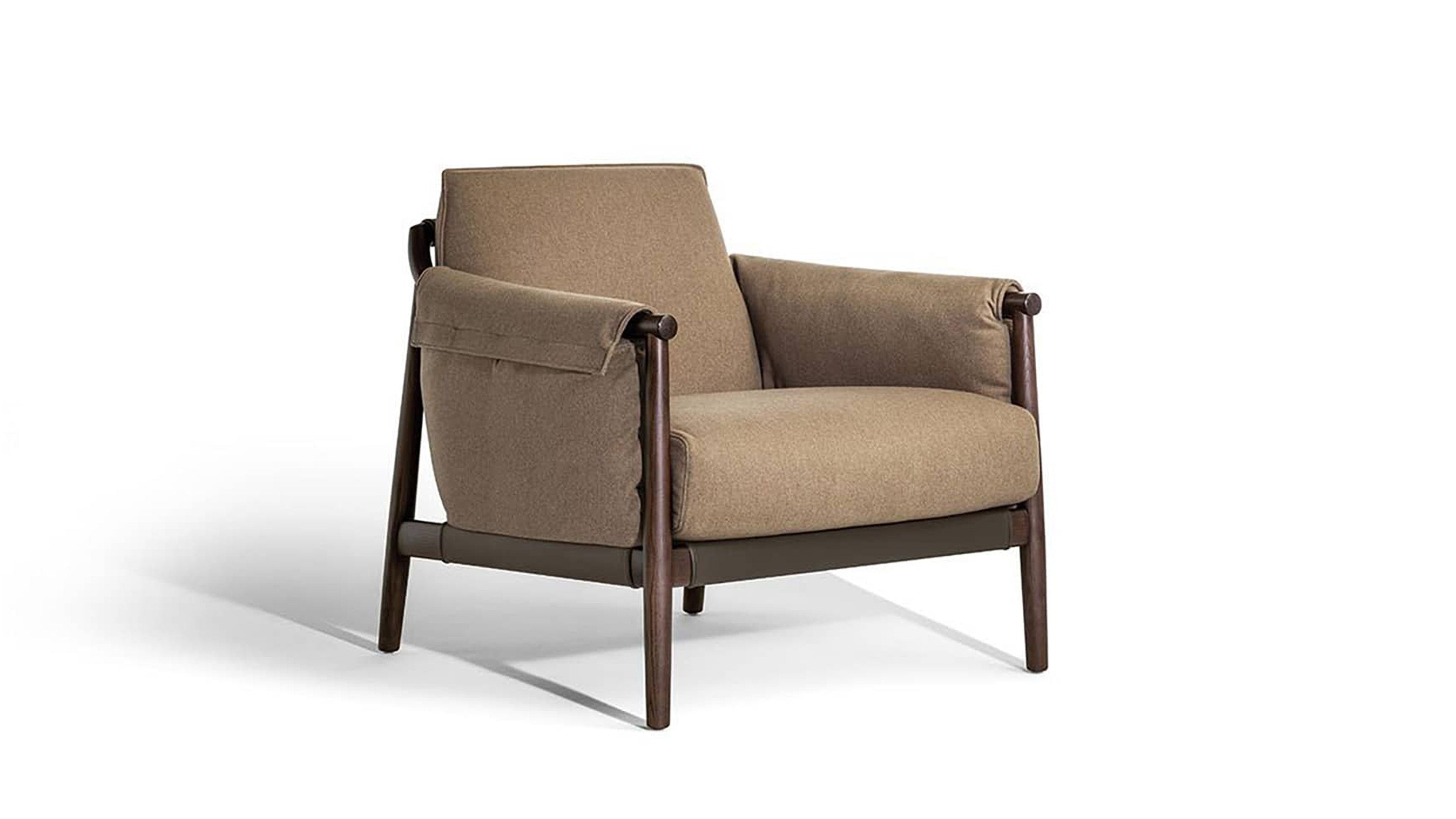Desktop / Times Lounge Armchair, designed by Spalvieri and Del Ciotto made by Poltrona Frau 