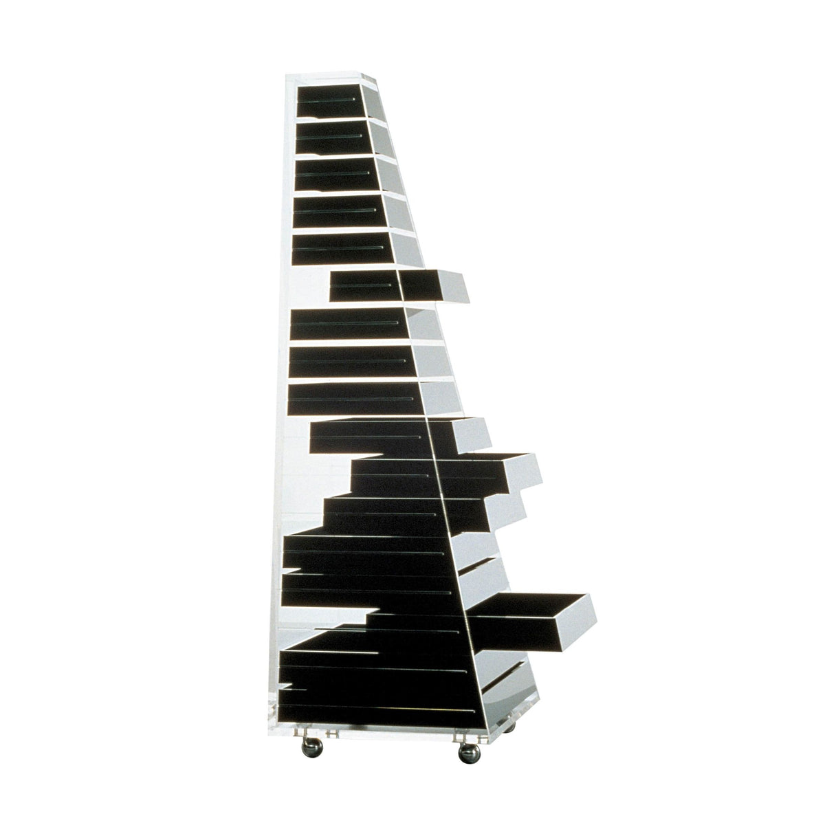 Cappellini Pyramid by Shiro Kuramata. A tilted tower of black and white stepped shelves on wheels.