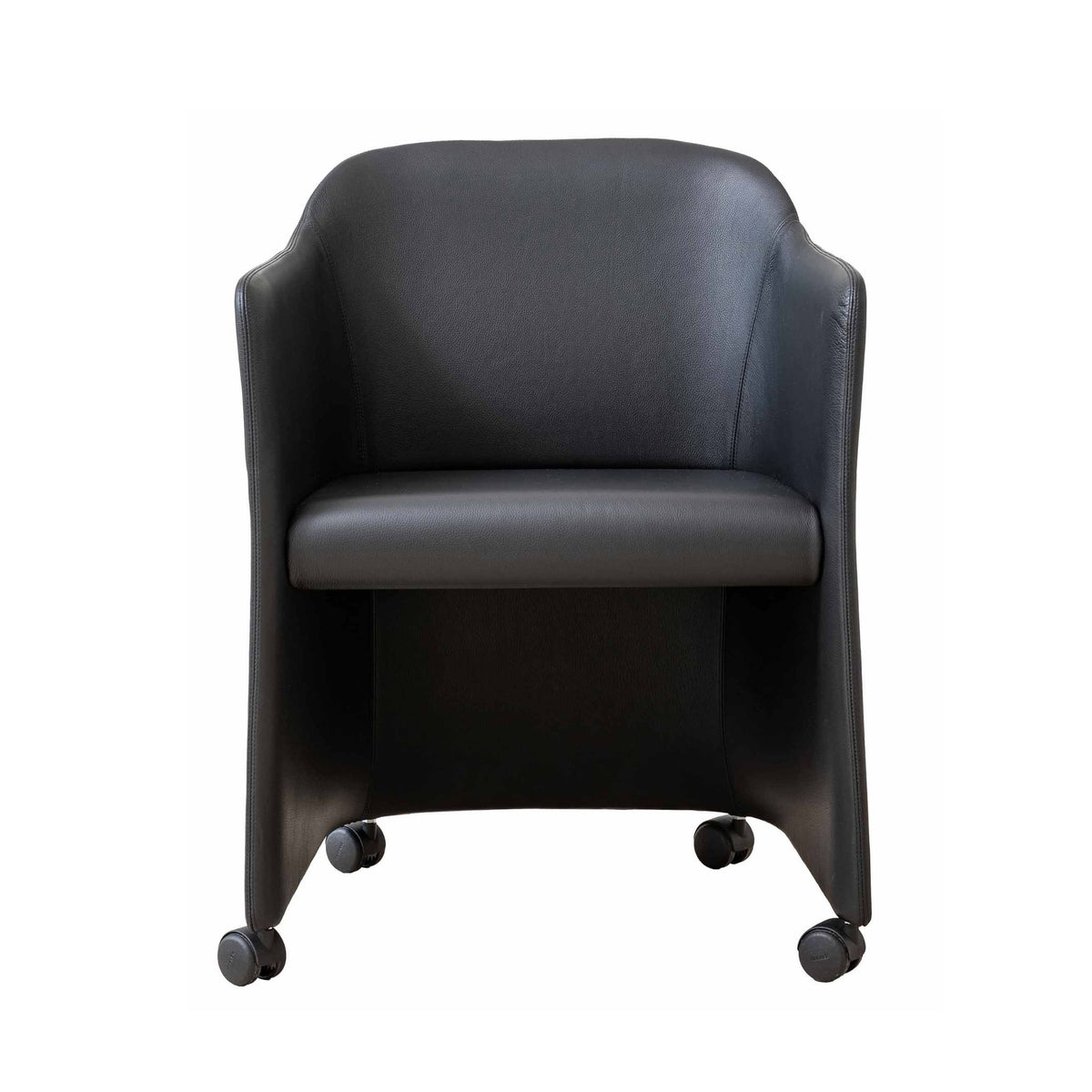 Cappellini San Siro by Jasper Morrison. A sleek black leather chair with wheels sits against a white background.