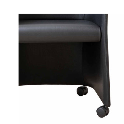 Cappellini San Siro by Jasper Morrison. Black leather chair with padded armrest and rolling casters.