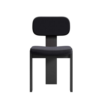 Cappellini Selettiva Cantù by Giulio Cappellini. A minimalist black chair with padded seat and backrest on wooden legs.
