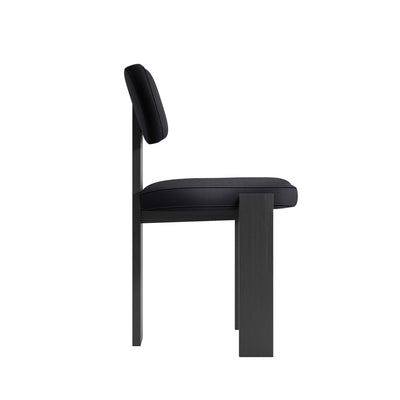 Cappellini Selettiva Cantù by Giulio Cappellini. A modern black chair features a wooden frame with padded seat and backrest.
